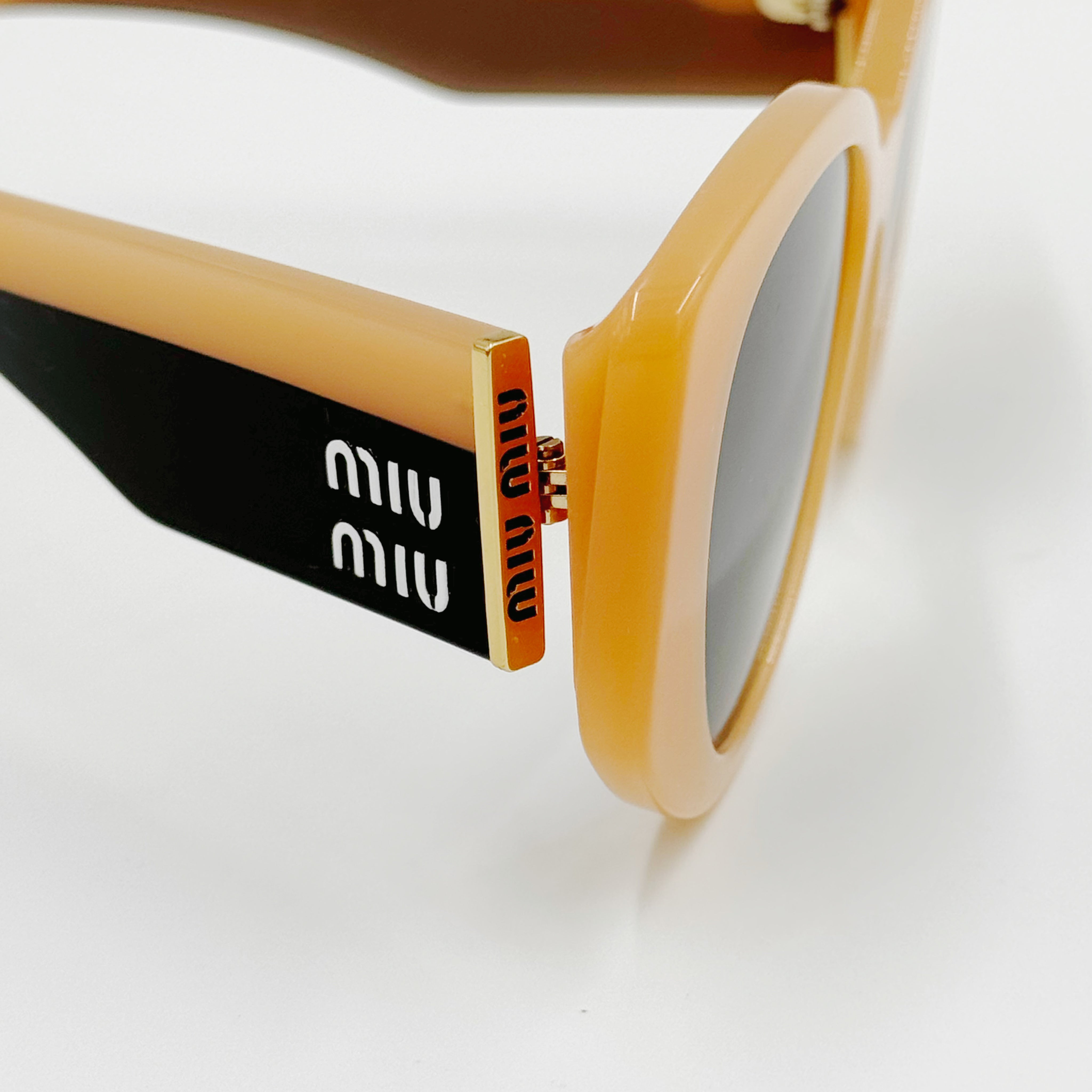 MiuMiu SMU03W Rosa/Beige