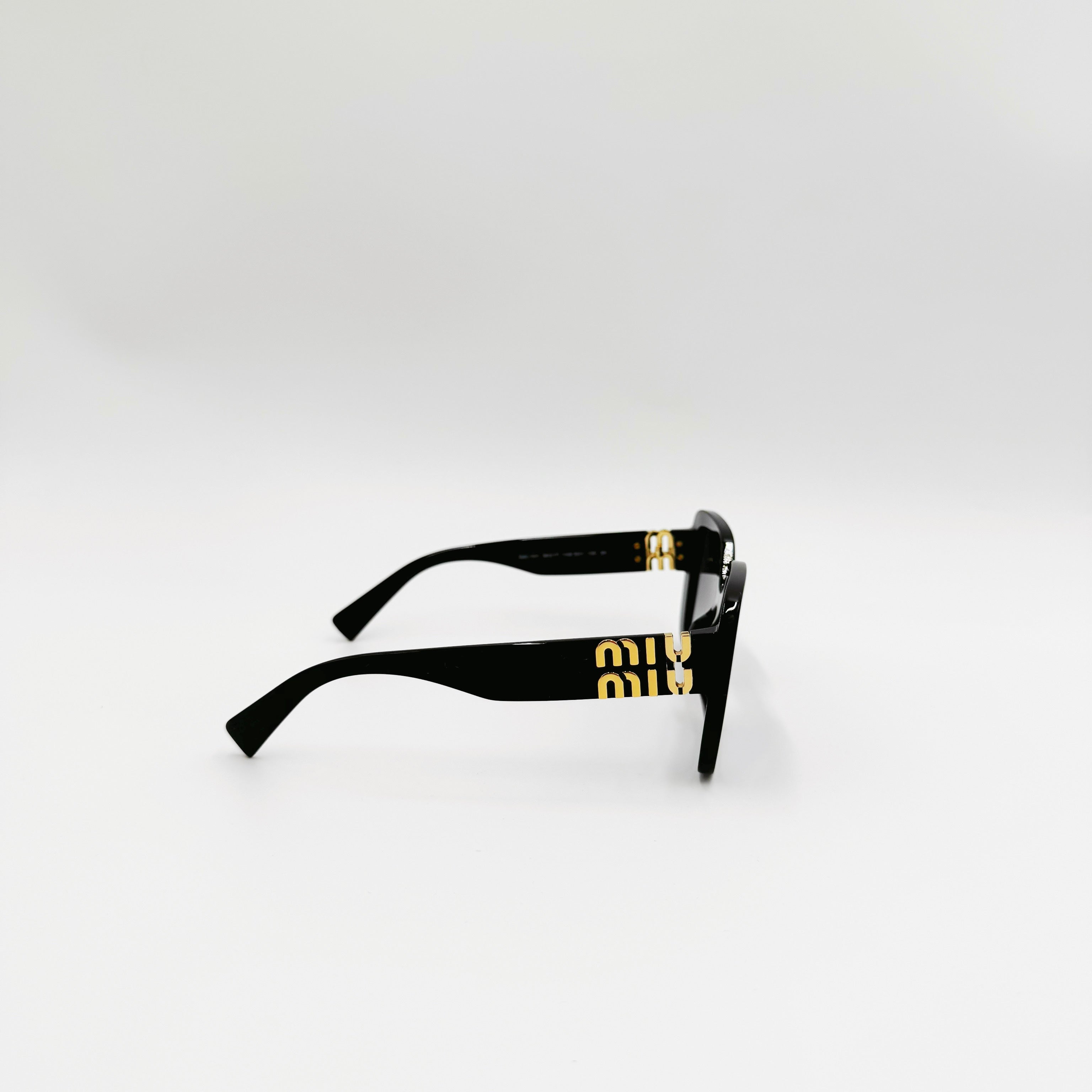 MIU MIU SMU10Y sort
